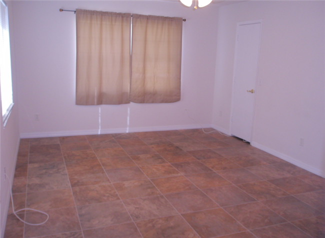 rental renovation tile in Landlord Hank's duplex