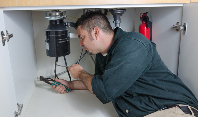 Rental property maintenance: How to troubleshoot a broken garbage disposal