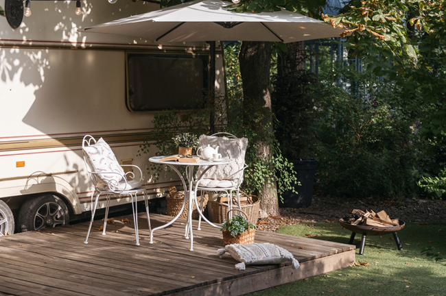 What should you do if a tenant moves an RV into the backyard of your rental and then someone starts living in