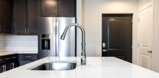 Quartz countertops are consistent and quick to fabricate, require few components, and manufacturers are keeping large amounts ready to cut and install.