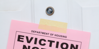 A court employee trying to serve an eviction notice and a police officer who tried to help him were shot and killed during an eviction over unpaid back taxes