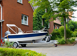 What to do when tenants have too many vehicles on your rental property and what should the lease say is the question for Landlord Hank